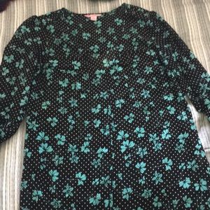 Black blouse with green floral and polka dots